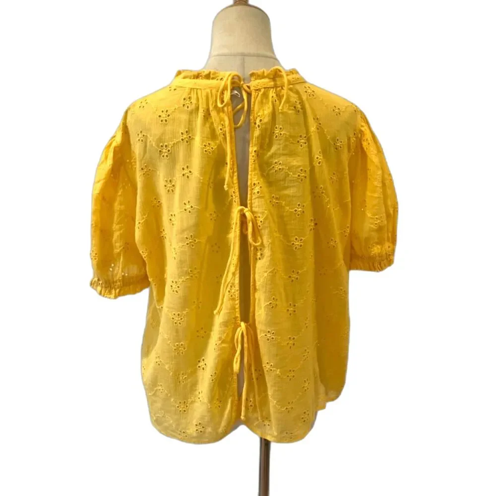 Free People Eyelet Tie-Back Blouse Nostalgic, romantic, vintage-inspired, airy